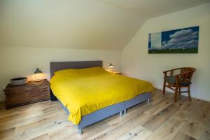 Postel nebo postele na pokoji v ubytování Landgoed Wilgenheerd