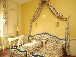 Postel nebo postele na pokoji v ubytování Château de Rigny