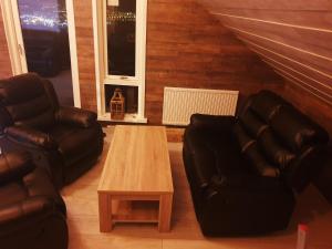 Posezení v ubytování Akureyri Loghouse