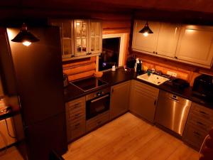 Kuchyň nebo kuchyňský kout v ubytování Akureyri Loghouse