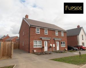 a large red brick house with a driveway at Contractors & Groups & Family Relocation - Flipside Property Aylesbury - Call Us Today For Special Offer! in Bierton