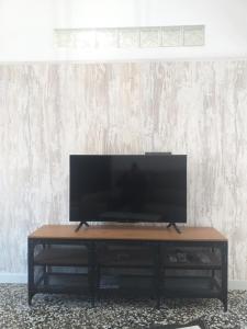 TV a/nebo společenská místnost v ubytování El Refugio