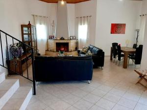 A seating area at Vasiliki's House Zacharo , 27054 , Ilias