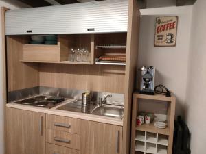 A kitchen or kitchenette at L'angolo nascosto