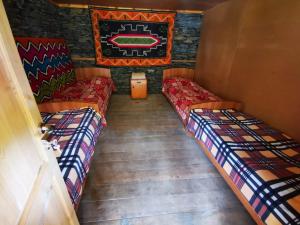 Postel nebo postele na pokoji v ubytování Guesthouse Everest