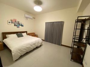 Llit o llits en una habitació de 18 Walking Homestay