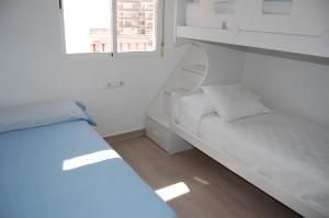 Posteľ alebo postele v izbe v ubytovaní Atico cerca del mar con vistas