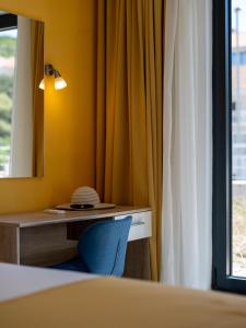 Ein Bett oder Betten in einem Zimmer der Unterkunft Hotel D'Elegant Dubrovnik