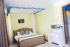 Postel nebo postele na pokoji v ubytování Serenity Home