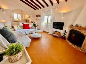 TV a/nebo společenská místnost v ubytování Cristina by Sun & Sea Homes