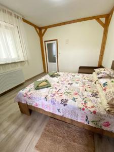 a bedroom with a bed in a room at Villa “Eleon” in Velyka Bihanʼ
