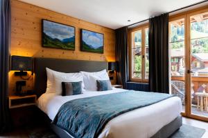 Katil atau katil-katil dalam bilik di Hotel-Restaurant Valrose