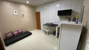 A cozinha ou cozinha compacta de Apartamento 1 aconchegante São Jorge