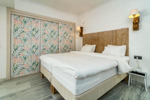 Postel nebo postele na pokoji v ubytování GC - Spacious flat in Golden beach Marbella + 37 fotografií