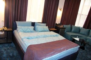Voodi või voodid majutusasutuse Nice Hotel Yerevan toas