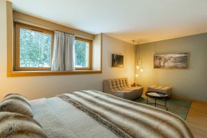 מיטה או מיטות בחדר ב-La Ferme du Lanchet
