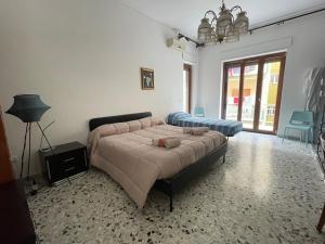 Krevet ili kreveti u jedinici u objektu Il Cavalluccio Marino Room Sea View