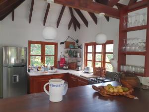 A kitchen or kitchenette at Harbour View House Villa