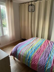 Posteľ alebo postele v izbe v ubytovaní Maison à l’île de la Barthelasse