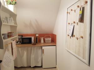 Kuchyň nebo kuchyňský kout v ubytování Les 7 Tilleuls - Chambres d'hôtes