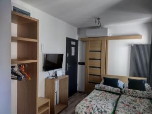 Posteľ alebo postele v izbe v ubytovaní A, Starówka mikroapartament Miodova