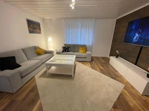 Posezení v ubytování Ferienwohnung bei Bad Ems im Lahntal