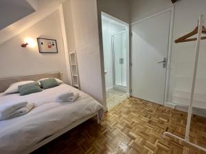 Posteľ alebo postele v izbe v ubytovaní Le Gite moderne - Gite urbain à Dunkerque