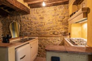 A kitchen or kitchenette at San Lazzo Luxury Room - ROOM & PERSONAL SPA