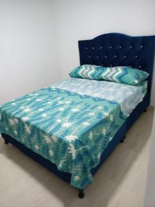 Postel nebo postele na pokoji v ubytování Apartamento cafetero portal del prado