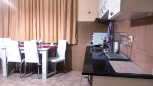 A kitchen or kitchenette at ApartmentDanny