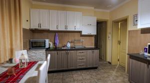 A kitchen or kitchenette at ApartmentDanny