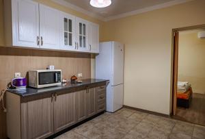 A kitchen or kitchenette at ApartmentDanny