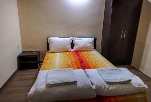 A bed or beds in a room at ApartmentDanny