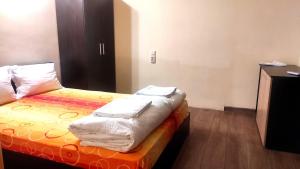 A bed or beds in a room at ApartmentDanny