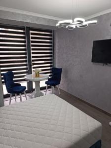 TV a/nebo společenská místnost v ubytování Apartment 1 Novi Sad
