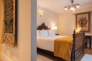 Uma cama ou camas num quarto em Quinta do Outeiro