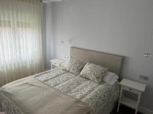 A bed or beds in a room at Casa La Rosada