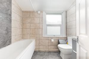 Fotografie z fotogalerie ubytování Cozy 4 bedroom home in Hackney, London v Londýně + 22 fotografií