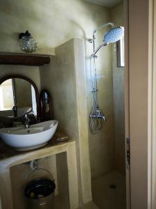 a bathroom with a sink and a shower at Casa Opuntia in Pappayiannádhes +72 photos