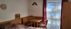 Postel nebo postele na pokoji v ubytování 2 Zimmer Mitterdorf