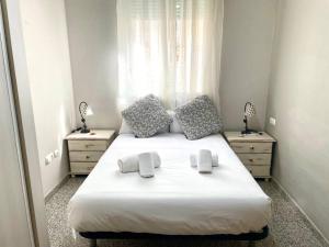 Posteľ alebo postele v izbe v ubytovaní Apartamento El Templo