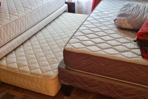 Ένα ή περισσότερα κρεβάτια σε δωμάτιο στο CABAÑA PARA RELAX EN OLMUE