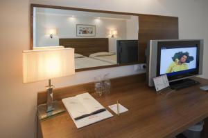 TV a/nebo společenská místnost v ubytování Hotel Burgas