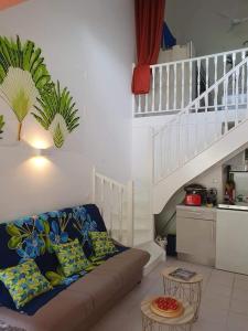 Posezení v ubytování Appartement KER-EOL Résidence CANOUAN Sainte-Anne avec piscine