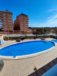 Bazén v ubytování Apartamento acogedor en Magic World, Torre la Sal nebo v jeho okolí