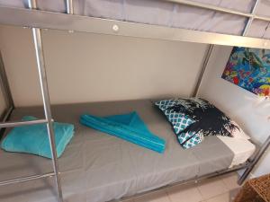Postel nebo postele na pokoji v ubytování Appartement KER-EOL Résidence CANOUAN Sainte-Anne avec piscine