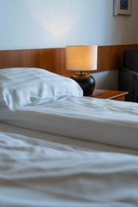 Voodi või voodid majutusasutuse Hotel Leirubakki toas