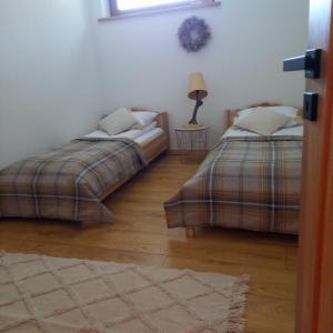 Postel nebo postele na pokoji v ubytování Babcia Góralka house