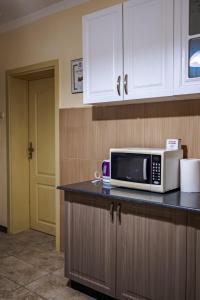 A kitchen or kitchenette at ApartmentDanny