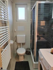 Ένα μπάνιο στο Apartment Una +8 φωτογραφίες